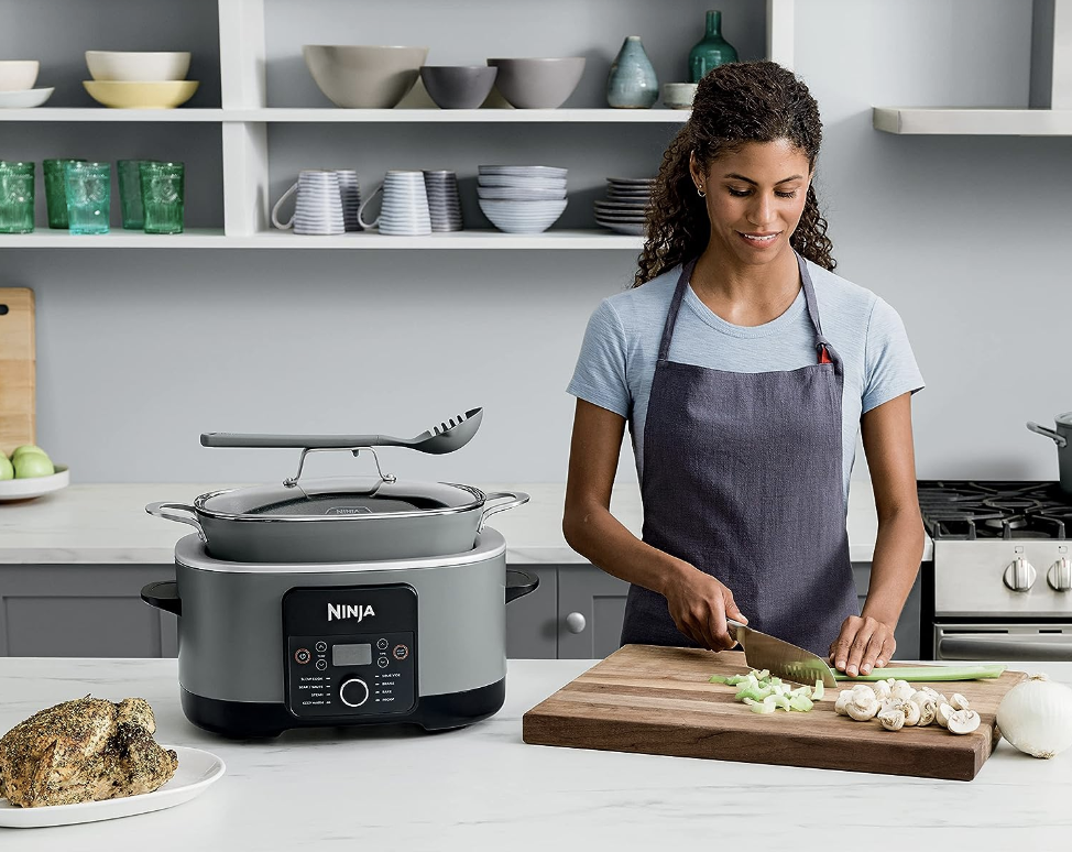 Woman with Ninja Foodi PossibleCooker