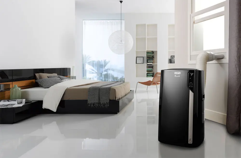 Delonghi 4-in-1 Portable Air Conditioner in bedroom