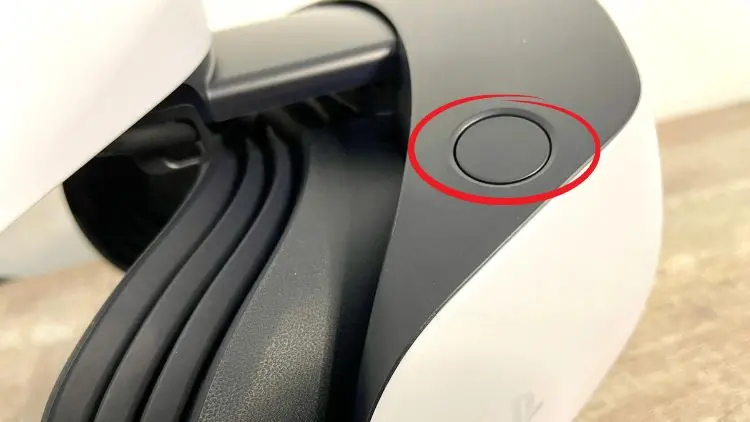 PlayStation VR2 scope adjust button circled in red.