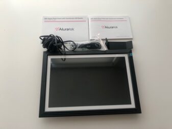 Aluratek digital photo frame unboxed. Aluratek digital photo frame unboxed with accessories.