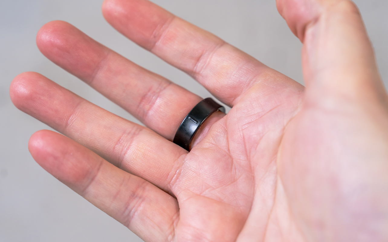 Samsung Galaxy Ring on middle finger underneath showing notch.