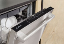 A Bosch dishwasher with the door open.