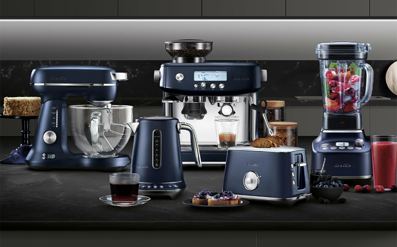 A line-up of Breville small appliances in an elegant blue finish.